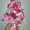 Baby corsages start at $17.50. Pictured is $25.00